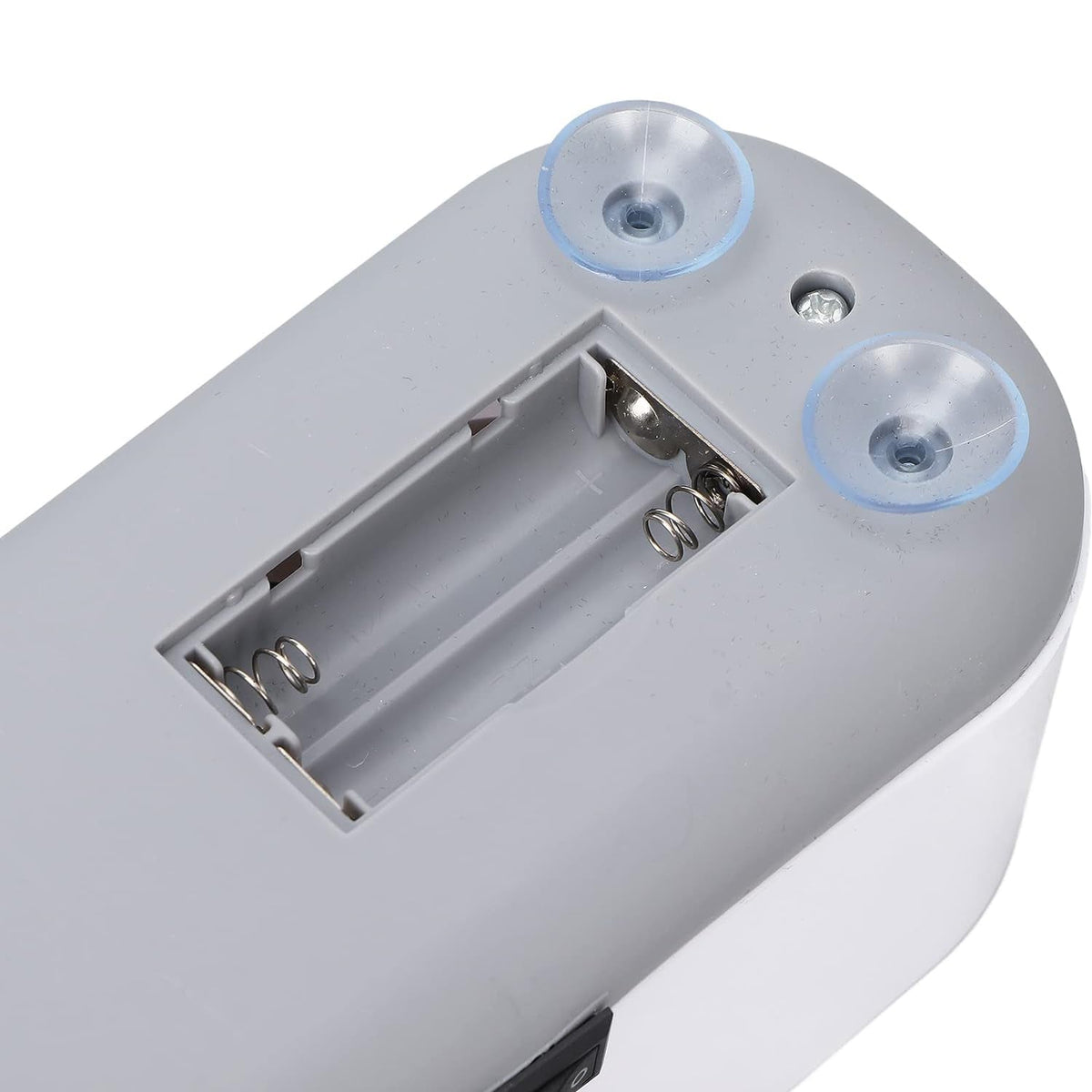 Battery compartment for 2 cells under the cleaner (batteries not included)