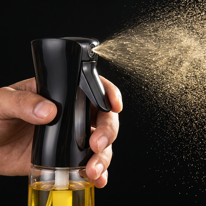 Fine oil mist from the sprayer nozzle close-up