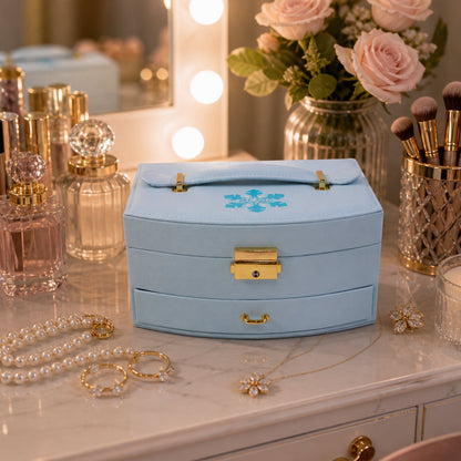 Light blue jewellery box on a dressing table