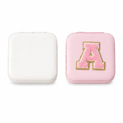 Travel jewellery box colours: white, and pink with a letter patch